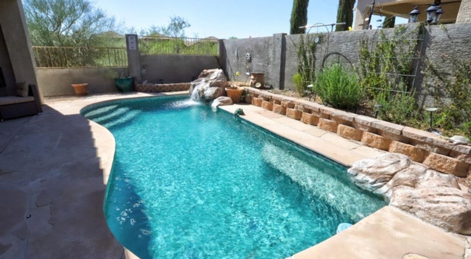 Fully Furnished 4 bedroom 2 bath with amazing backyard oasis! 