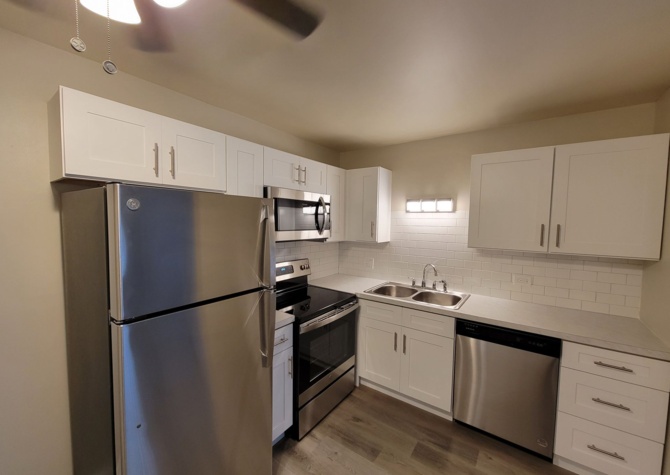 Apartments Near Updated Apartment With NEW KITCHEN & BATH With Balcony/Patio/Private Parking!