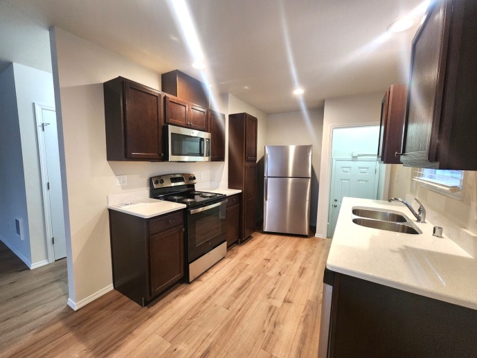 Fully Renovated Townhomes! Brand New Stainless Steel Appliances! 
