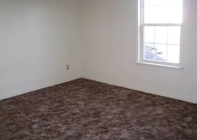 Houses Near This unit features carpet throughout! All three bedrooms are upstairs,