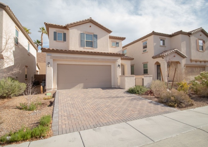 Houses Near MOVE IN SPECIAL - ONE MONTH FREE W/13 MONTH LEASE!!! GUARD GATED 3 BD 2.5 BTH HOME IN HENDERSON