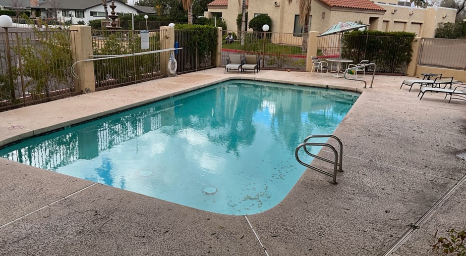 Location Location! Must see 2 bed 2.5 bath 1061sq ft townhouse in gated community with pool. Close to airport, Biltmore area, downtown Phx, Scottsdale 