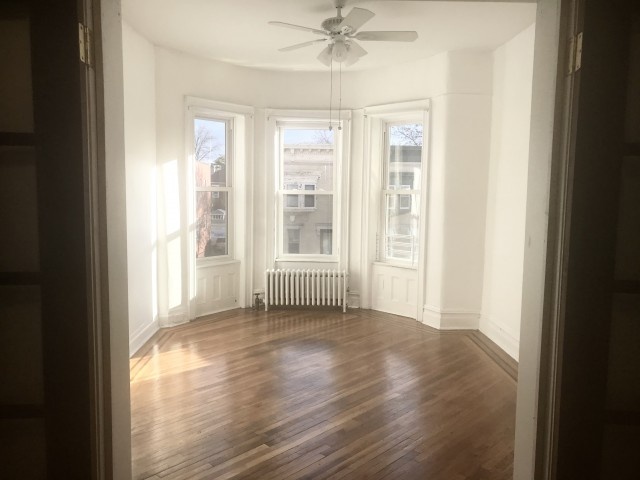 Sunny and Spacious 3 BR apartment with living room, dining room, newly renovated with oak floors and historic details