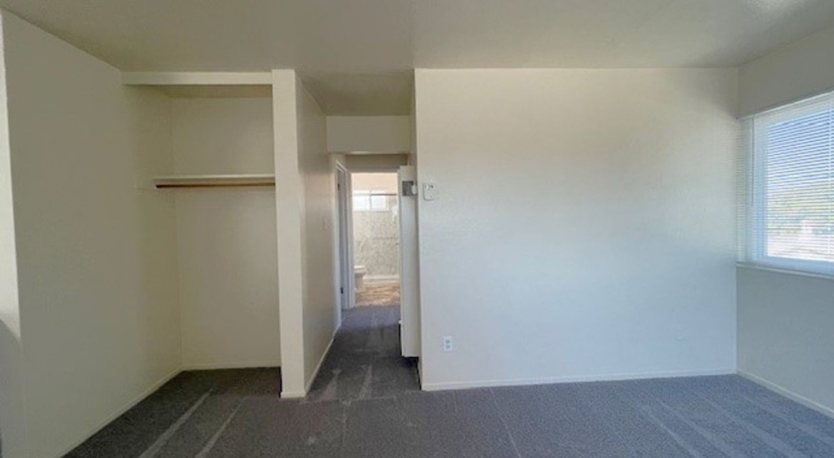  Upper- 2 Bedroom-One Bath apartment has a large living room