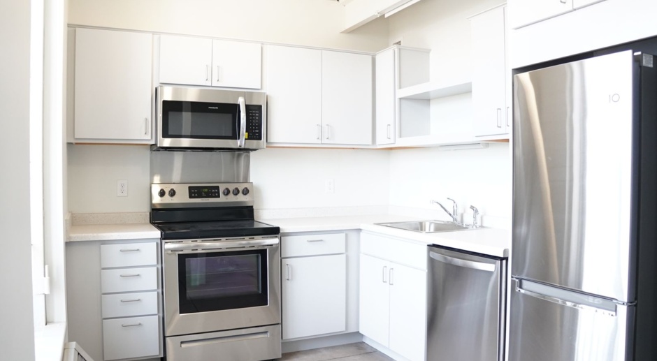 AVAILABLE JUNE Lofted Two-Bedroom: Spacious Layout with Walk-In Closets! + A Storage Room