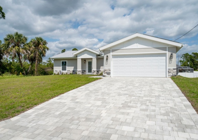 Houses Near WATER & SOLAR INCLUDED - BRAND NEW 3 bed / 2 bath / Office / 2 car garage! NORTH PORT FLORIDA