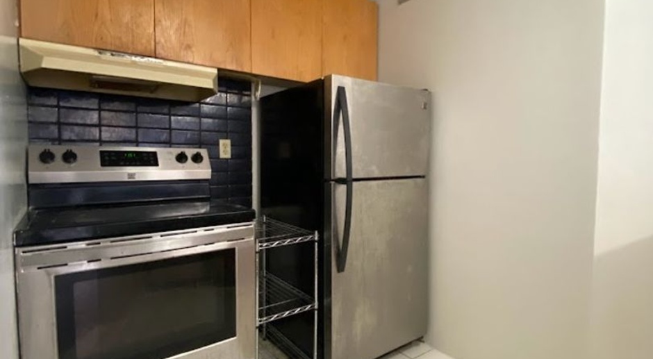 Executive Center, 1 bedroom, 1 bath, 1 covered parking stall includes water & sewer, walk to the conveniences of Downtown