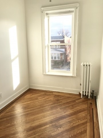 Sunny and Spacious 3 BR apartment with living room, dining room, newly renovated with oak floors and historic details